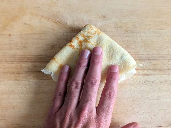 Ricotta and mushroom crepes: the perfect creamy vegetarian recipe for any occasion - Preparation step 10