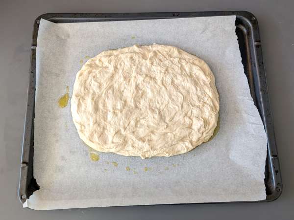 Thick, fluffy focaccia with cherry tomatoes, olives, and oregano - Preparation step 9