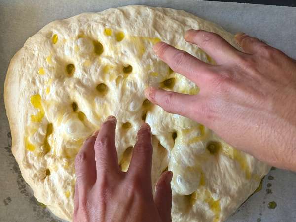 Thick, fluffy focaccia with cherry tomatoes, olives, and oregano - Preparation step 10
