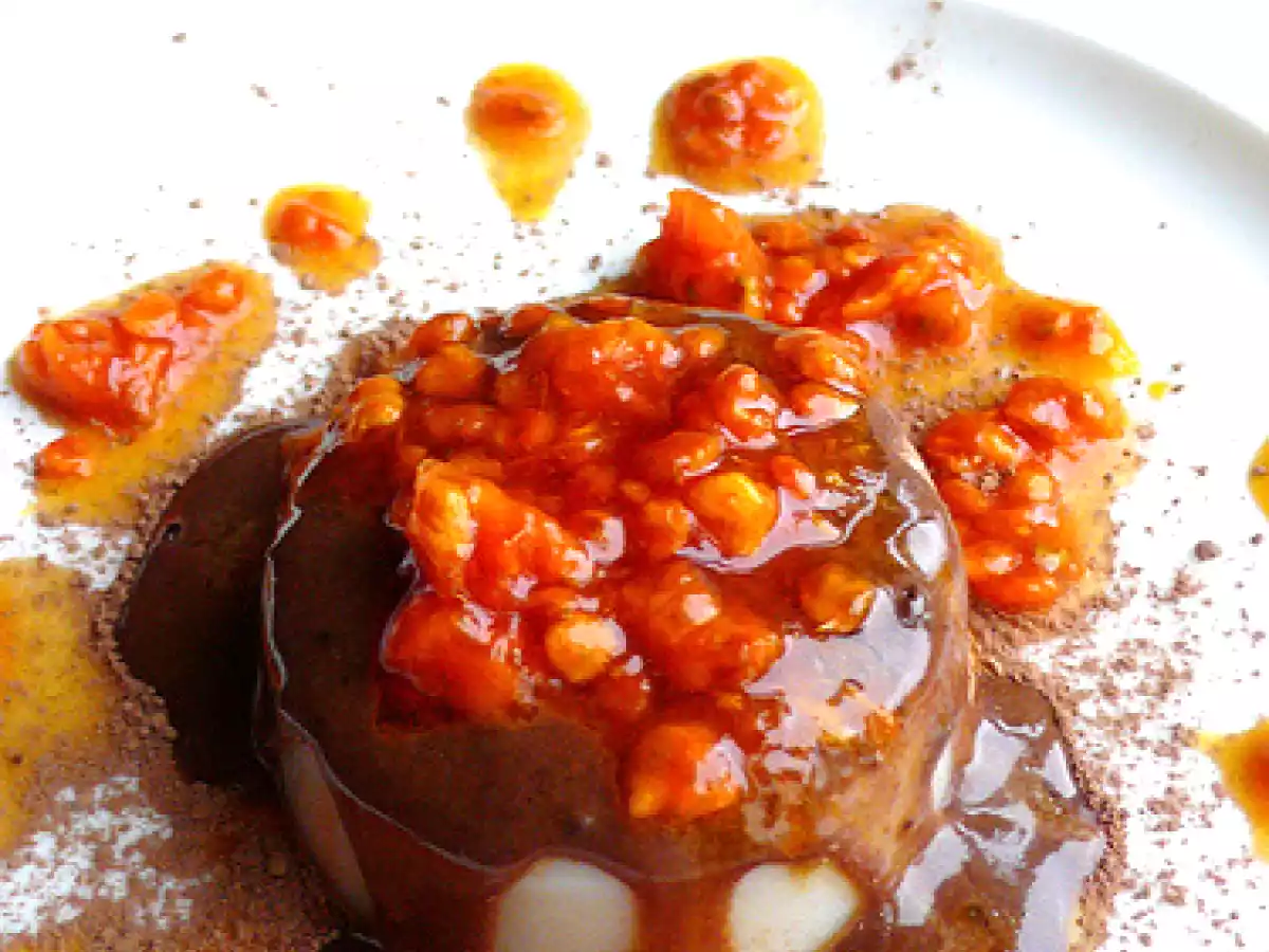 Almond pannacotta with cacao and carob sauce and prickly pears
