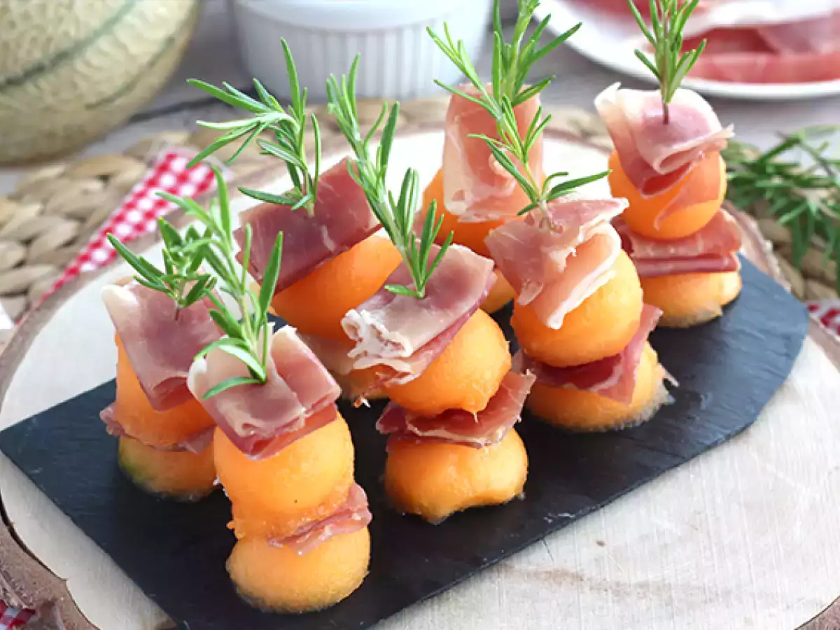 Appetizer skewers with melon, ham, and rosemary - photo 2