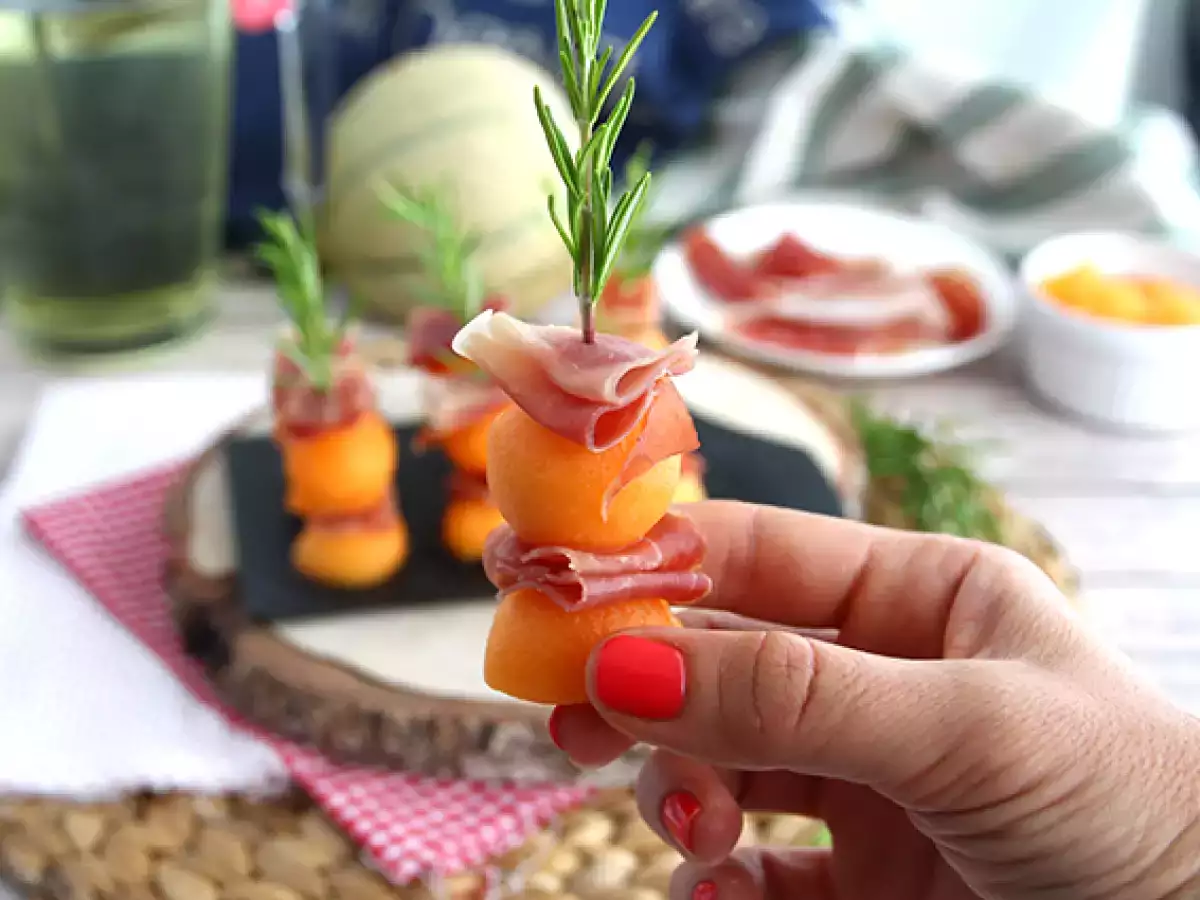 Appetizer skewers with melon, ham, and rosemary - photo 3