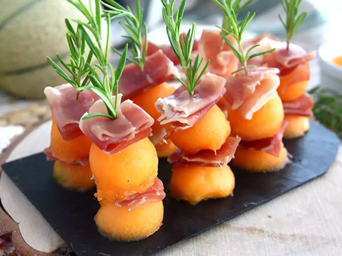 Appetizer skewers with melon, ham, and rosemary - photo 4
