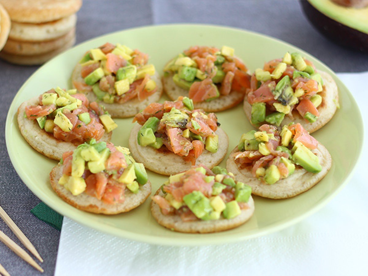 Avocado and salmon blini appetizer