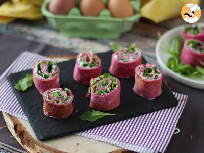 Beet crepe rolls with ricotta cheese and arugula