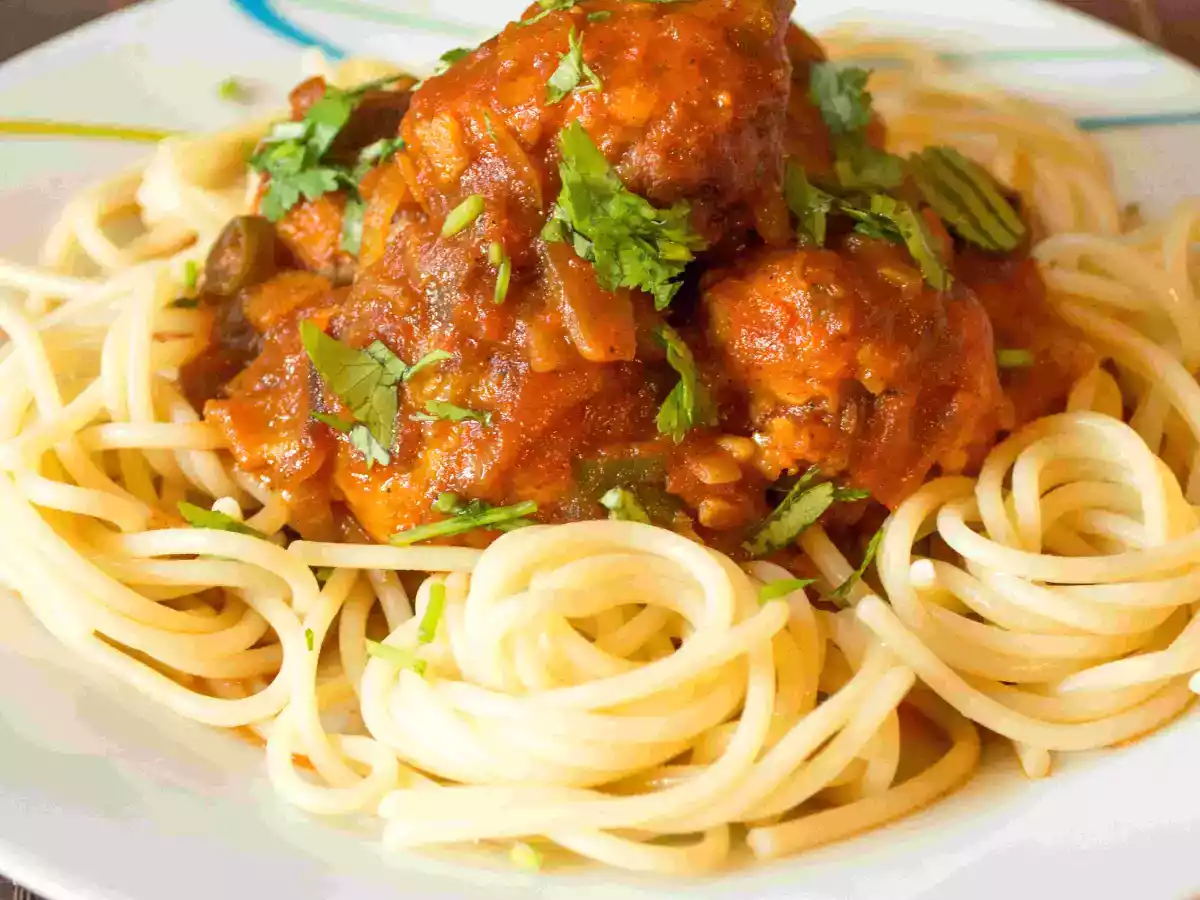Chicken meat balls Asian style over Spaghetti