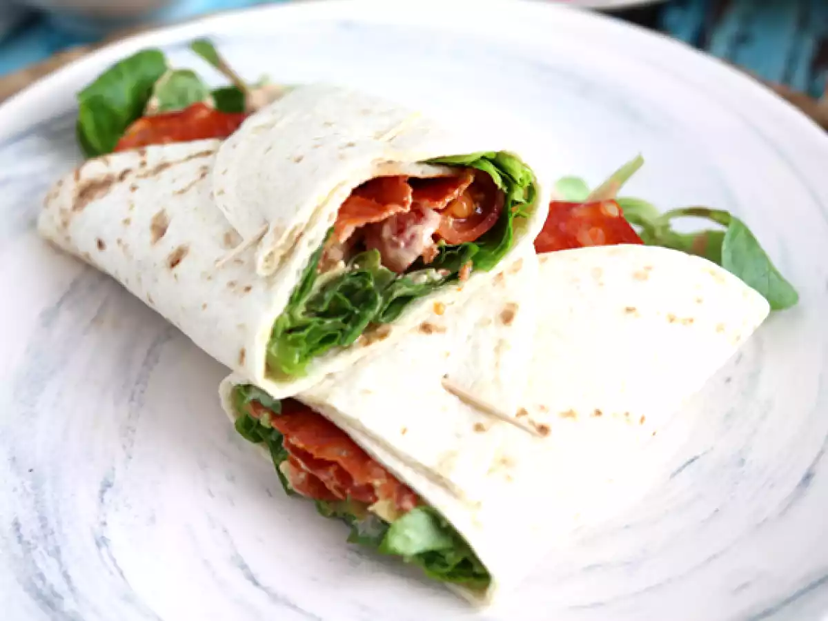 Chorizo, avocado, and tomato wrap sandwich