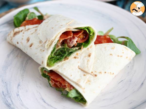 Chorizo, avocado, and tomato wrap sandwich