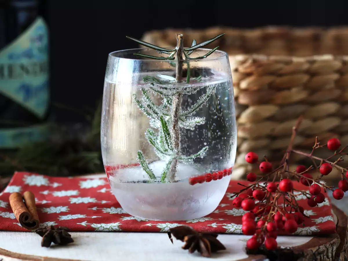 Christmas cocktail with a snow-covered fir tree inside