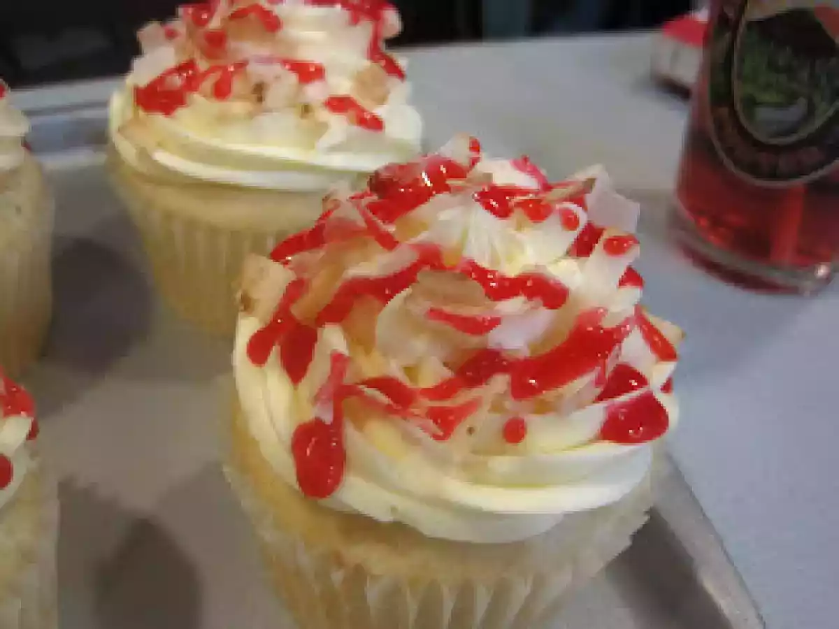 Coconut cake and cupcakes with guava curd and vanilla buttercream
