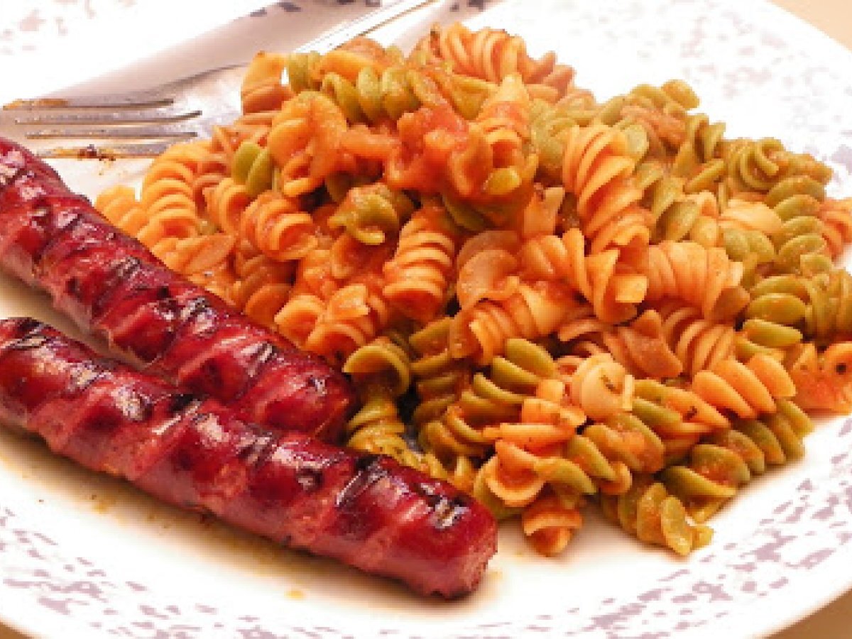 Colorful Fusilli Pasta and Grilled Bratwurst