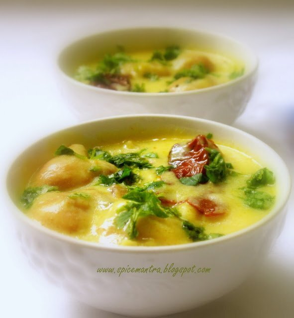 Couple of awards & gram flour dumplings in spicy yogurt sauce (punjabi