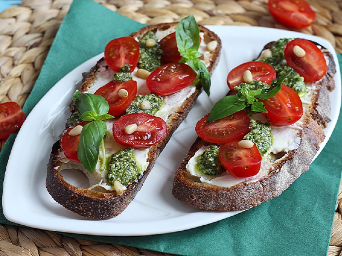 Cream cheese, pesto and cherry tomato toast