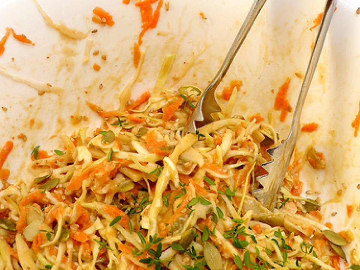 Creamy cabbage and carrot salad with pumpkin seeds, sesame and thyme