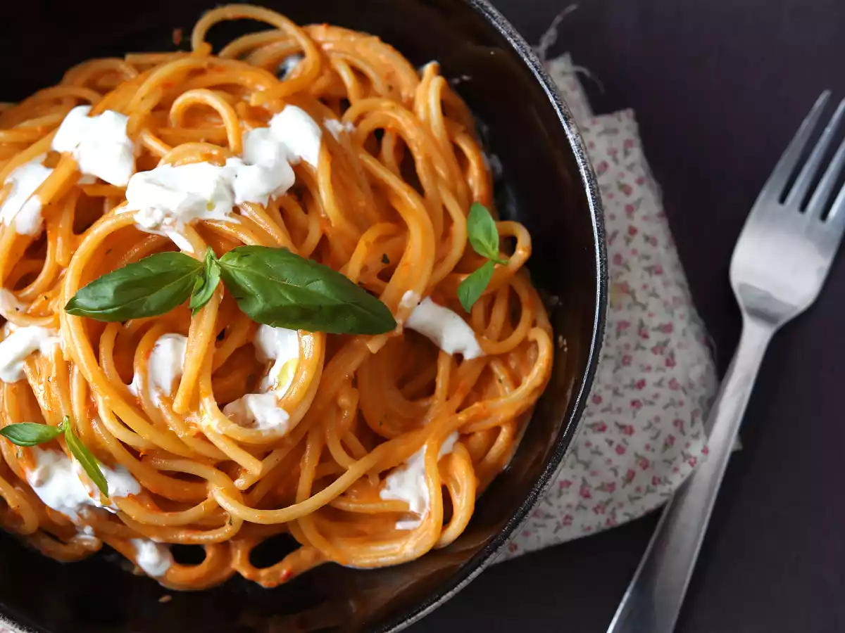 Creamy pasta with burrata cheese and cherry tomatoes - photo 2