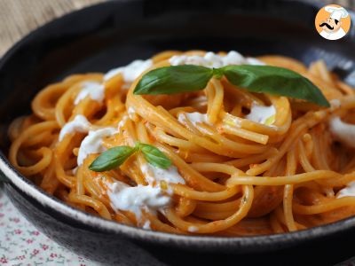 Creamy pasta with burrata cheese and cherry tomatoes