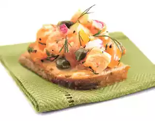Dilled salmon tartare recipe on whole grain bread