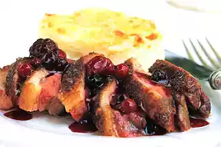 Duck breasts with berries recipe