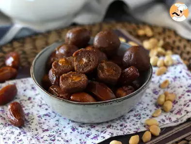 Energy balls with dates and a melting peanut butter heart