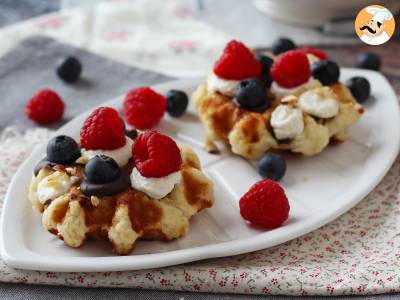 Fruit, chocolate and whipped cream waffles