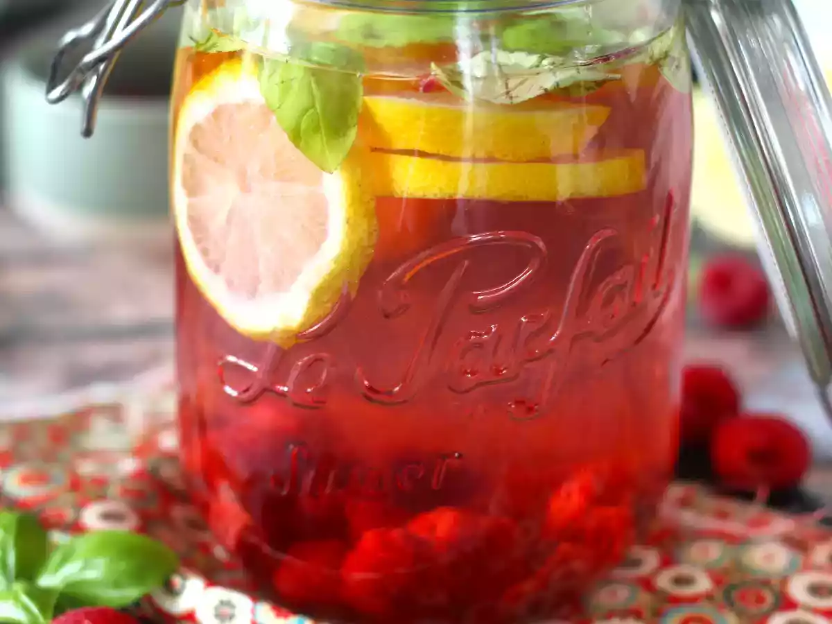 Homemade flavored water with lemon, basil and raspberry - photo 2