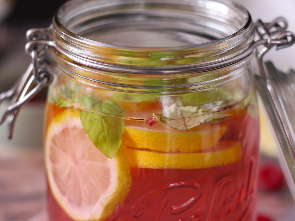 Homemade flavored water with lemon, basil and raspberry - photo 4