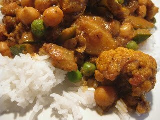 Indian style curry - potato, chick pea, zucchini, cauliflower and peas-image