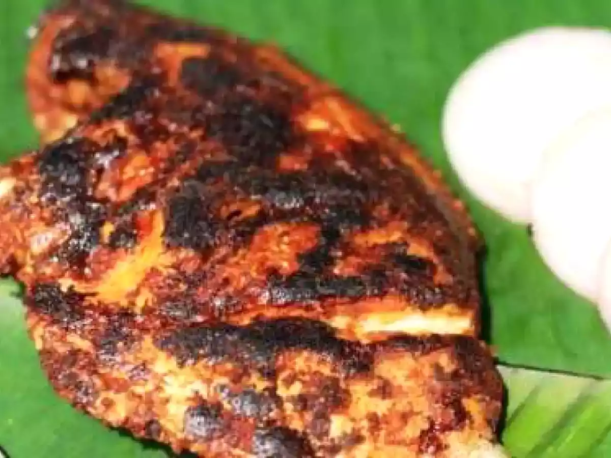 Karimeen vazhayilayil pollichathu/Pearlspot dry fried on Banana leaf - photo 2