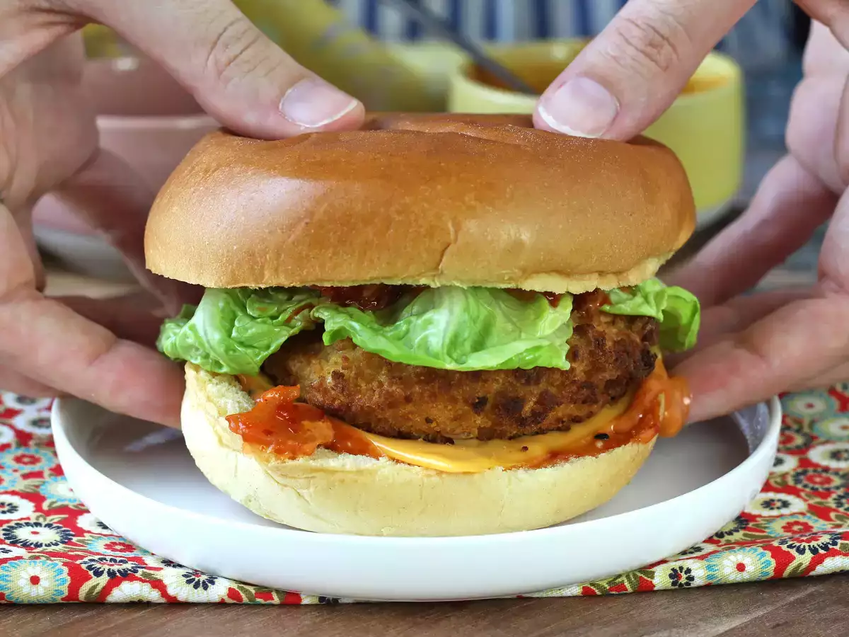 Korean-style crispy chicken burger with spicy sauce