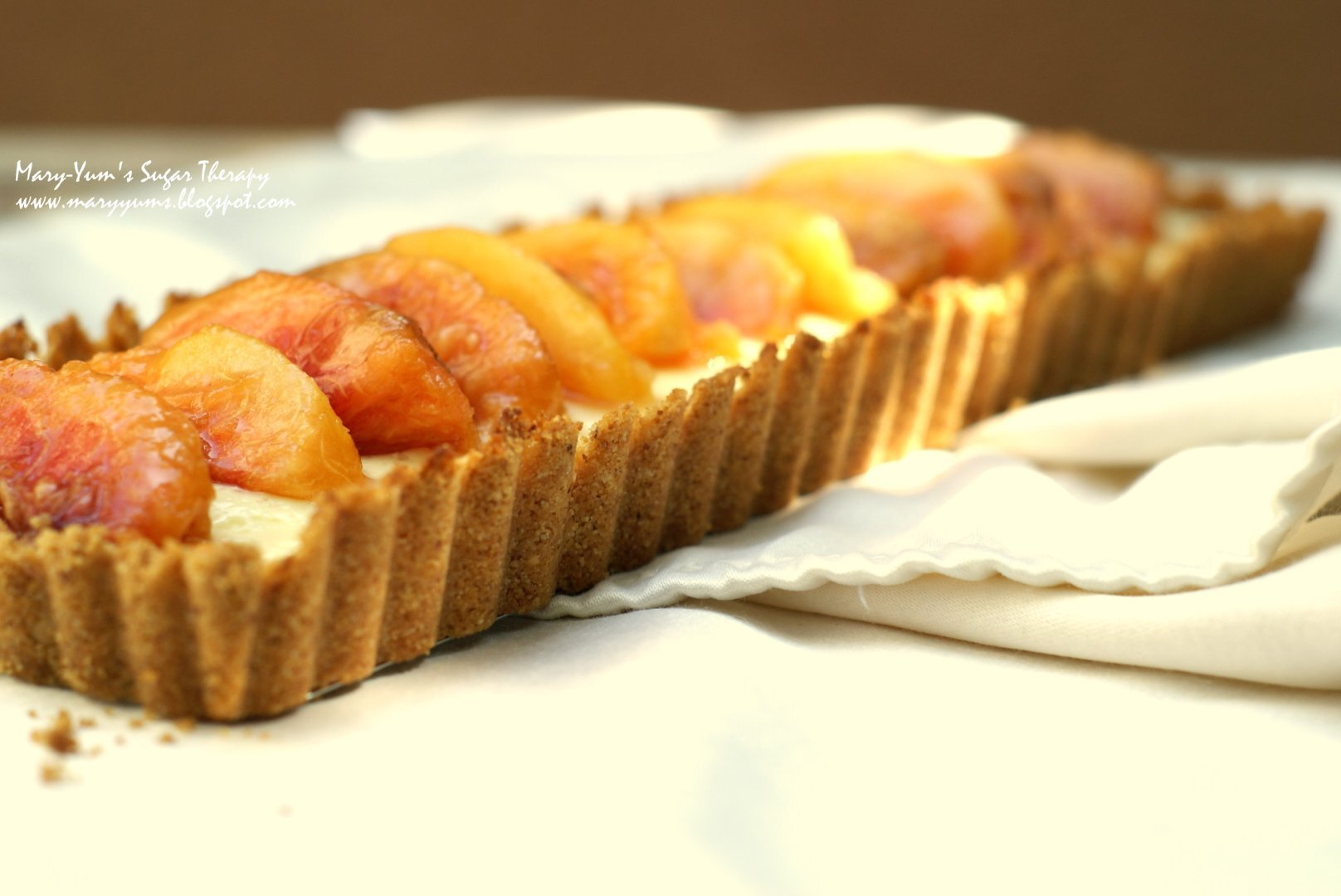 Mascarpone nectarine tart with smoky almond crust Recipe Petitchef