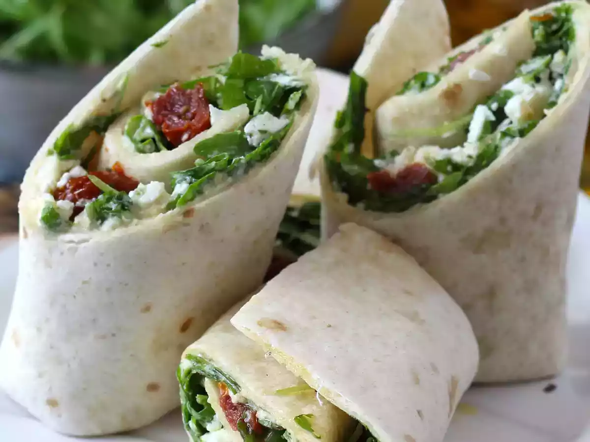 Mediterranean wrap stuffed with hummus, arugula, peppers and feta - photo 2
