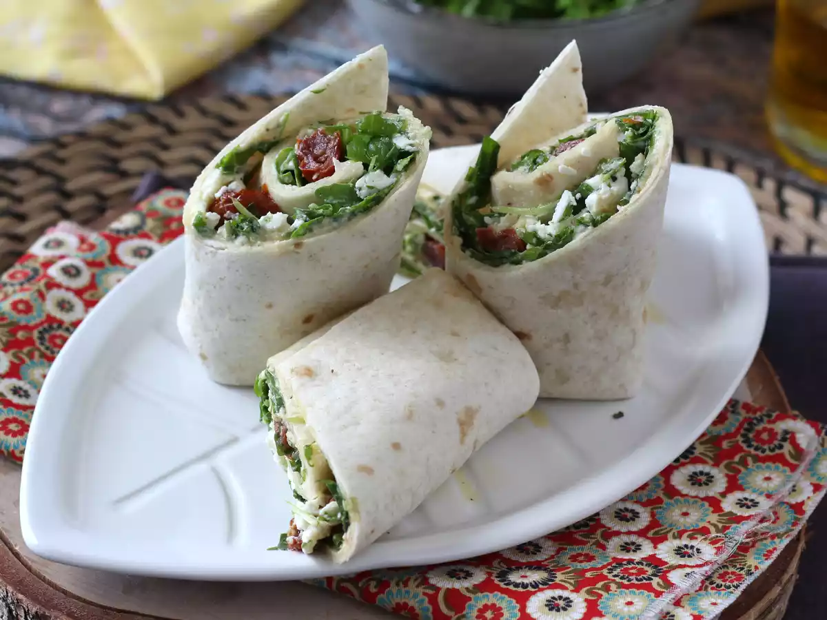 Mediterranean wrap stuffed with hummus, arugula, peppers and feta - photo 3