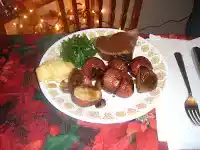 Oven baked roast beef, made with roasted potatoes and pearl onions