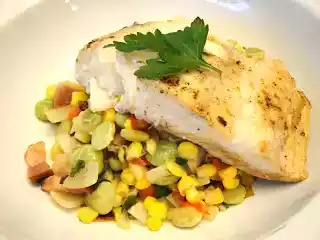 Pan fried halibut with succotash and bacon