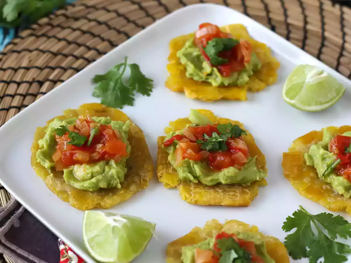 Patacones, colombian plantain toast with guacamole and tomatoes - photo 5