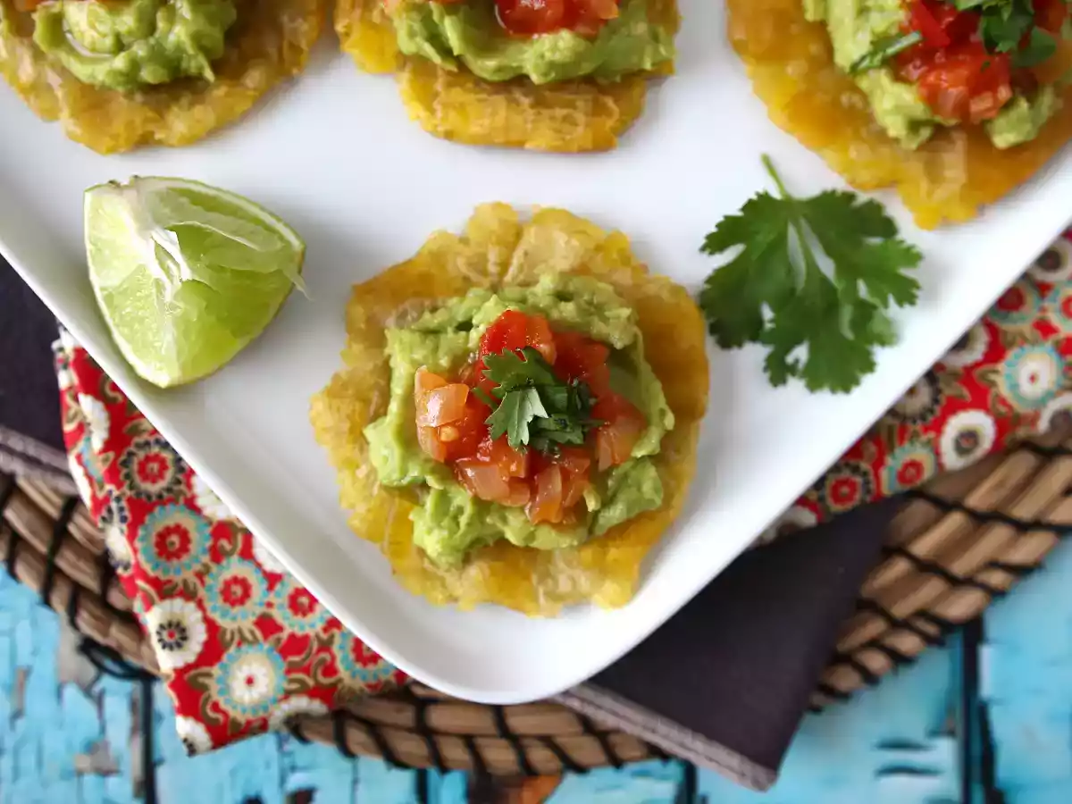 Patacones, colombian plantain toast with guacamole and tomatoes - photo 6