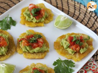 Patacones, Colombian plantain toast with guacamole and tomatoes