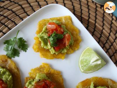 Patacones, Colombian plantain toast with guacamole and tomatoes - photo 3