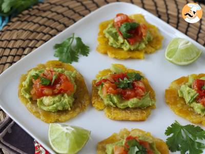 Patacones, Colombian plantain toast with guacamole and tomatoes - photo 5