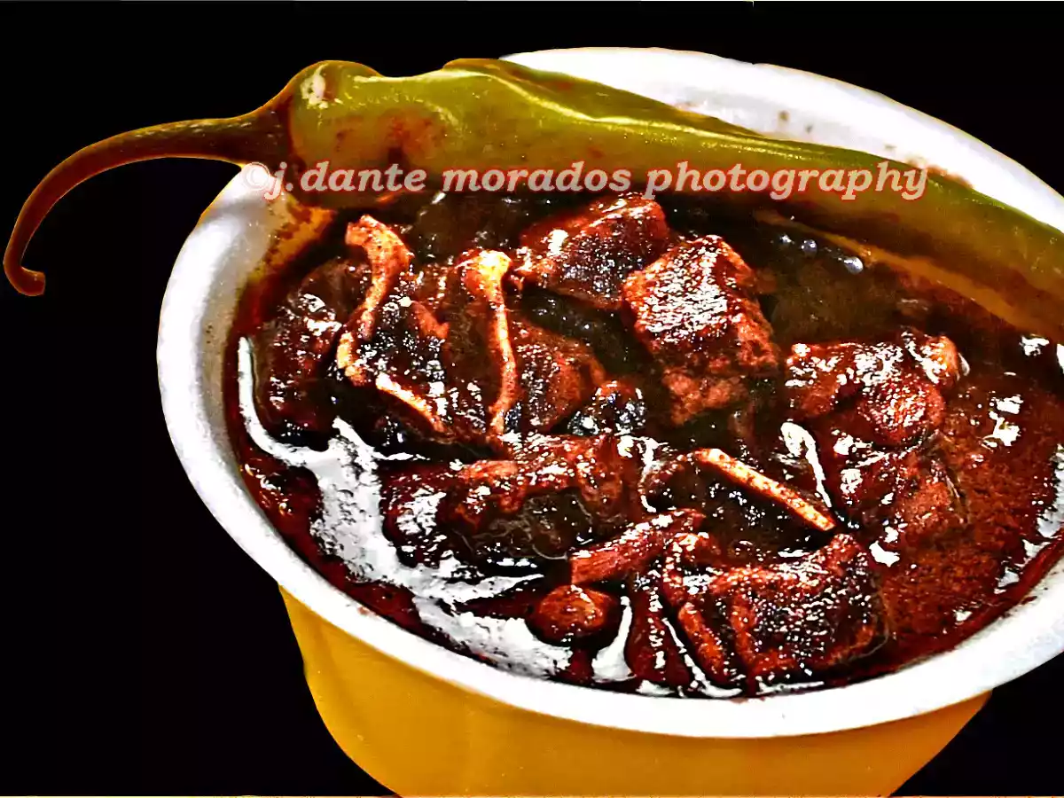 Piniritong DINUGUAN (Fried Pork Mask Stewed in Hog's Blood)