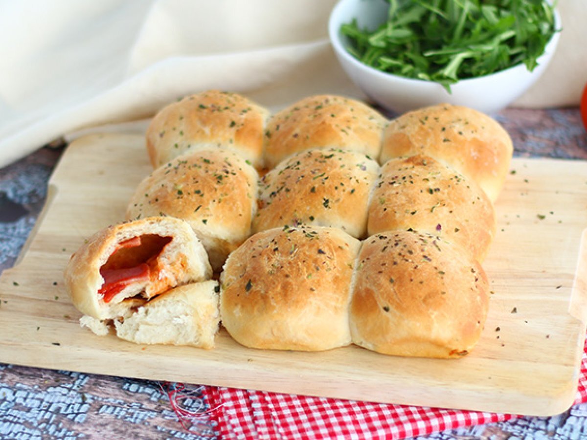 Pizza buns stuffed with ham and cheese