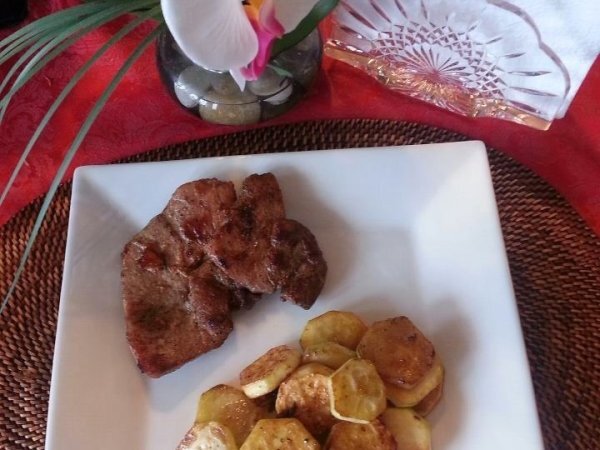 Pork chop with sauteed zucchini