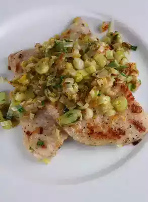 Pork cutlets recipe with leeks, lemon, and parsley