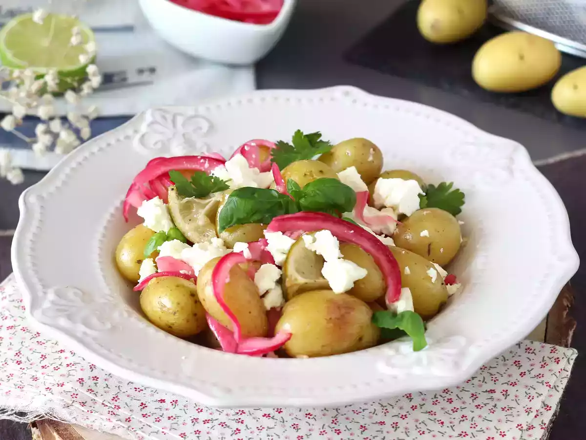 Potatoes in parchment with lemon and feta cheese