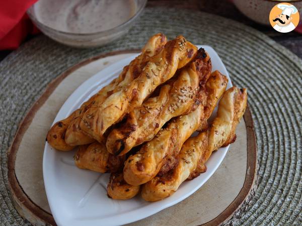 Puff pastry twists with red pesto and mozzarella