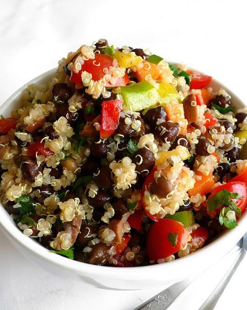 Quinoa and black chickpea salad with mixed vegetables and olives ...