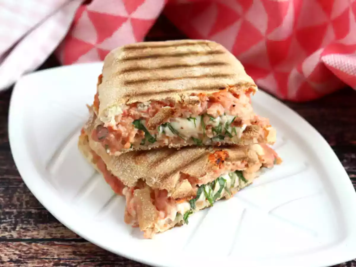 Salmon, mozzarella, and dill panini sandwich