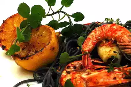 Squid ink pasta recipe with prawns and grilled calamari