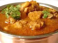 Slow cooker pork masala with red potatoes and baby carrots