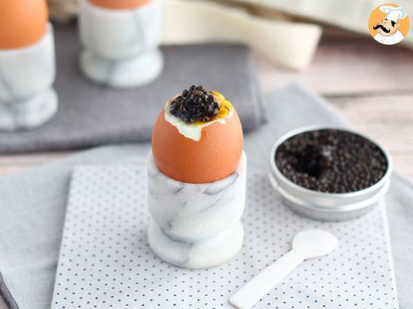 Soft-boiled eggs with caviar